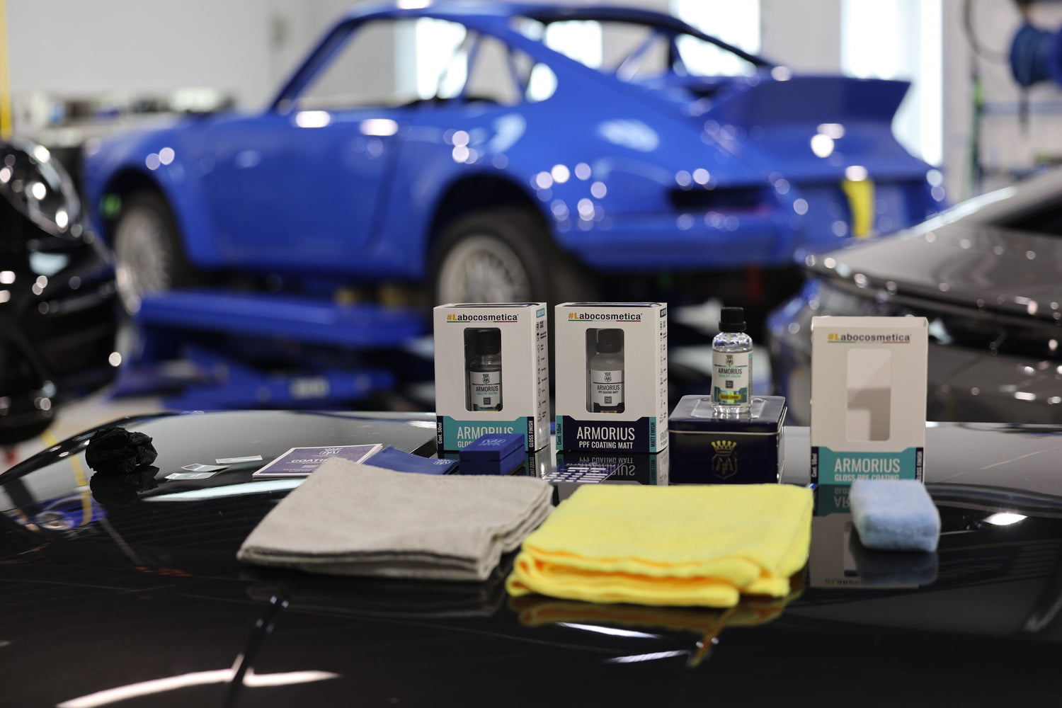 Labocosmetica Armorius PPF coating range with vintage blue Porsche 911 in the Alpha Details studio
