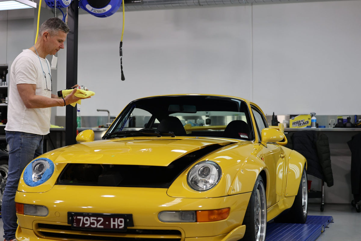 Yellow Porsche 911 in the Alpha Details studio