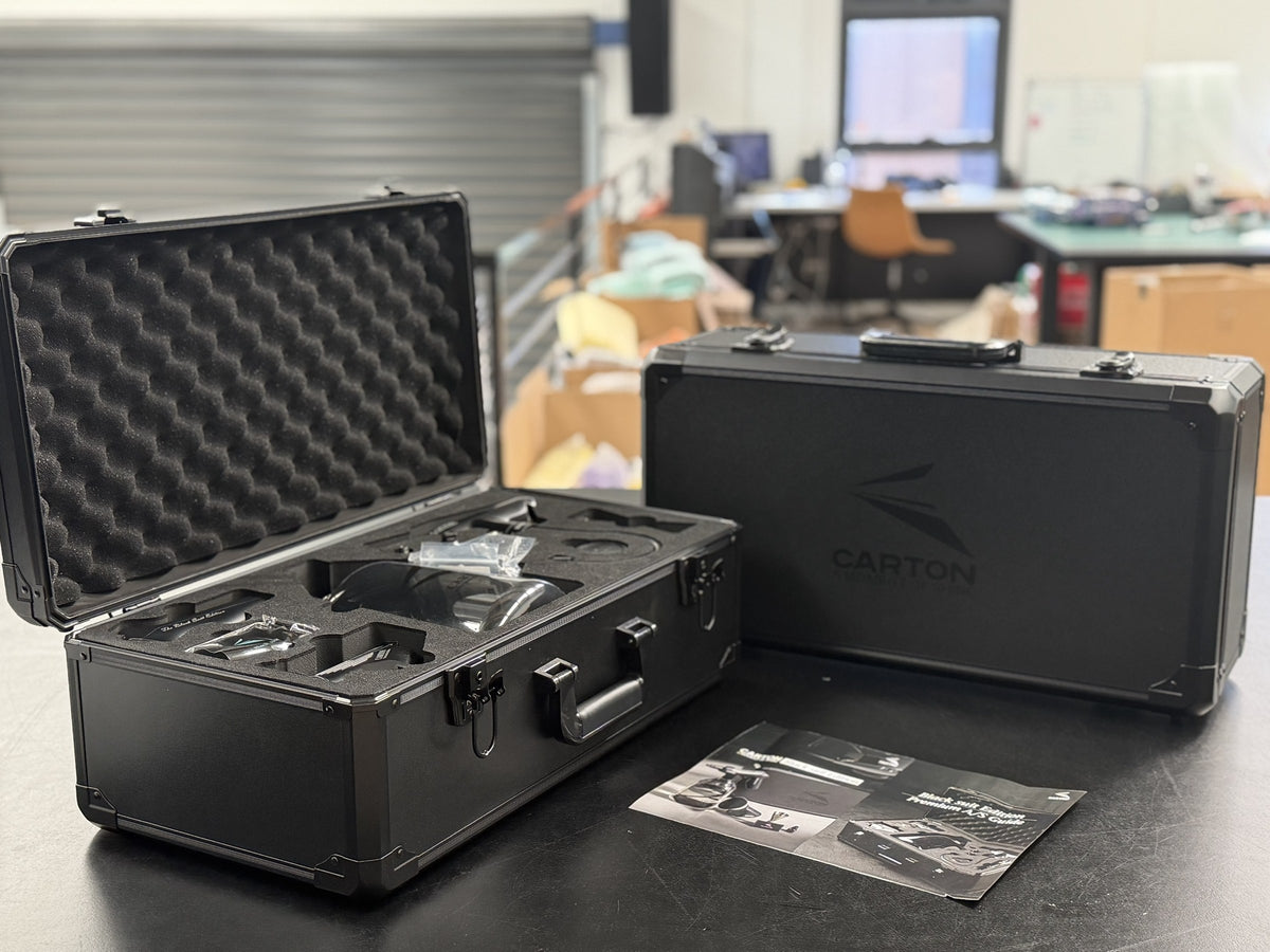 Carton Black Suit Edition outer branded case, foam-lined flight case and the Black Suit Edition Premium A/S guide