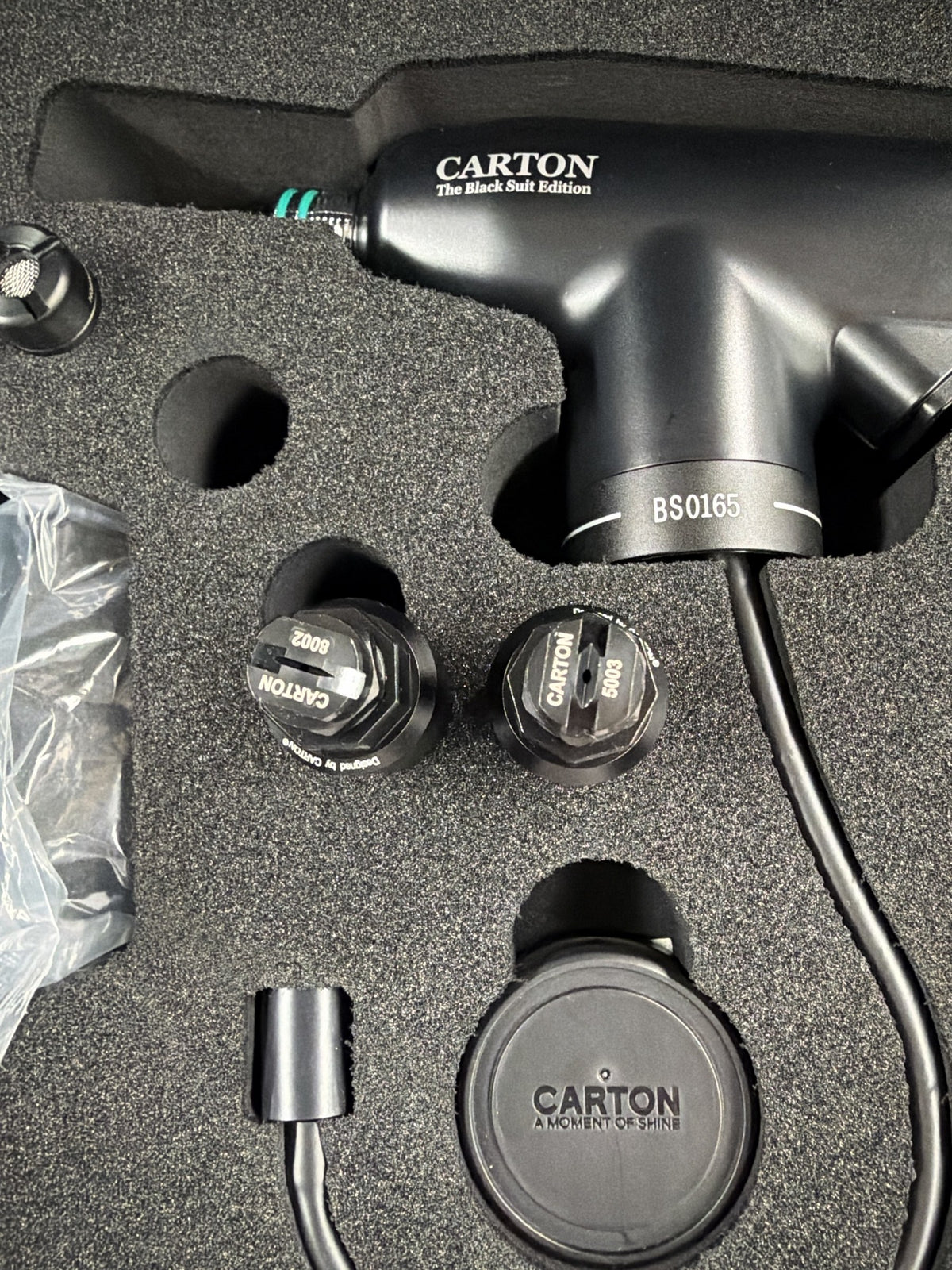Carton Black Suit Edition sprayer head serial BS0165 with the 8002 and 5003 spray nozzles and bottle cap