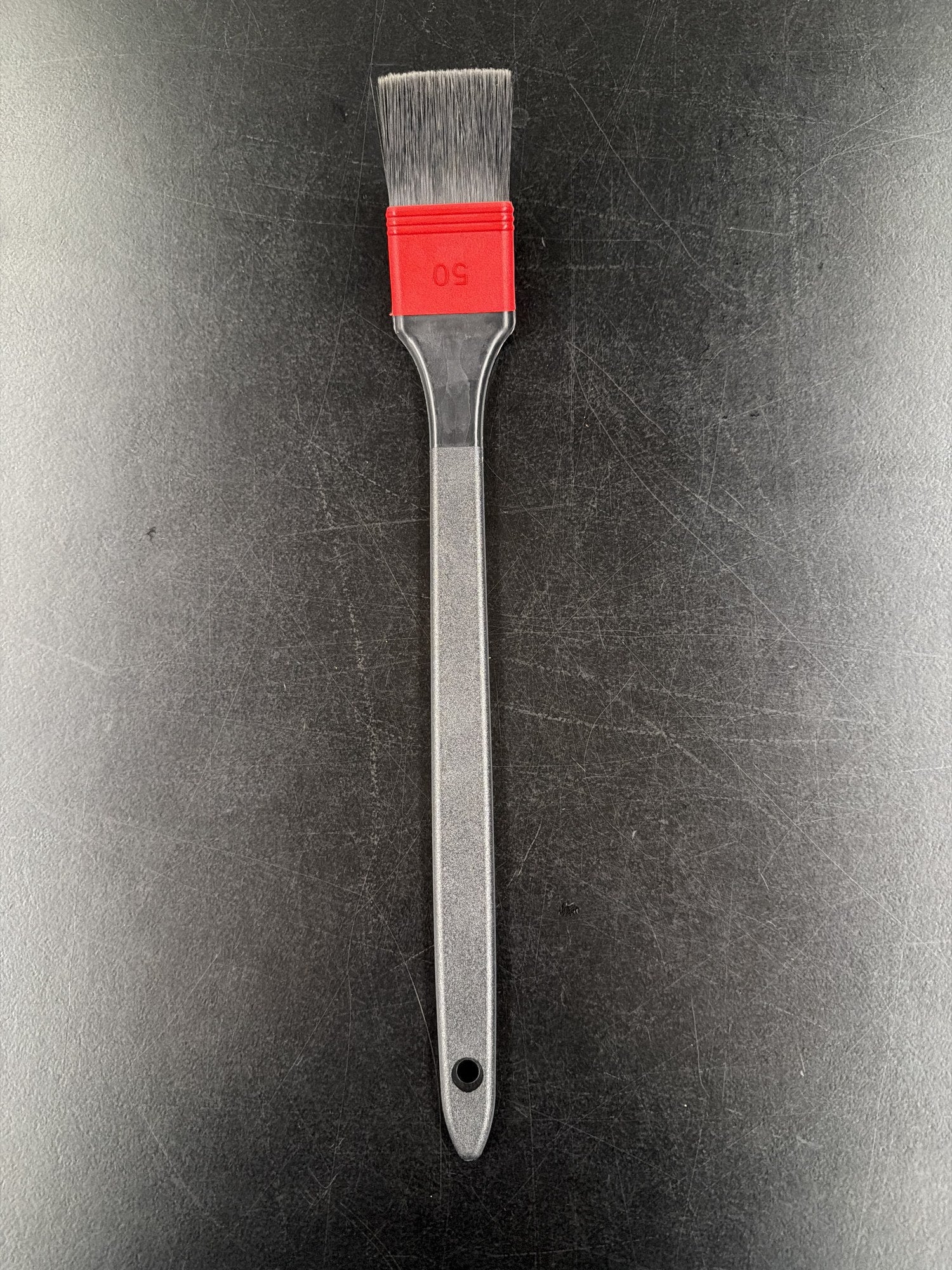 Soft flat 50mm detailing brush with red ferrule and long handle for wheel faces, trim, badges and panel gaps