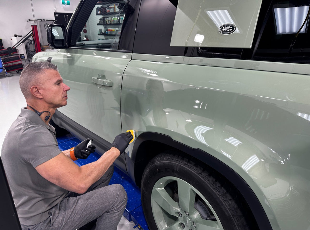 Feynlab Ceramic V3 being applied to a Land Rover Defender at the Alpha Details studio