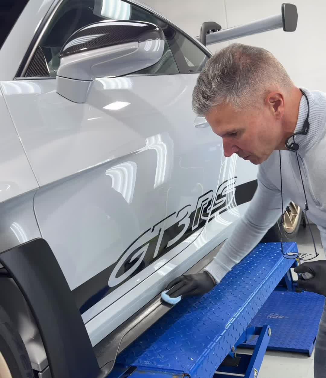 Feynlab Plastic V2 being applied to Porsche GT3 RS exterior trim at the Alpha Details studio