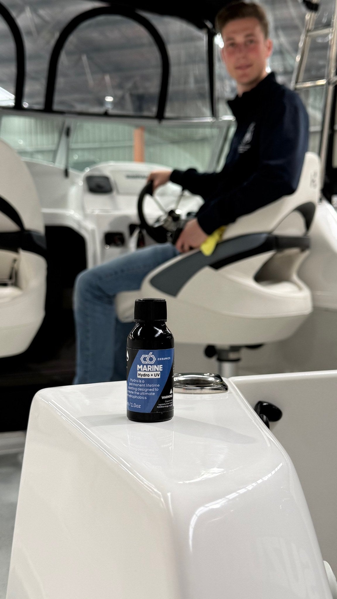 C6 Ceramics Marine Hydro + UV 30ml coating bottle on a boat console - applied by Alpha Details
