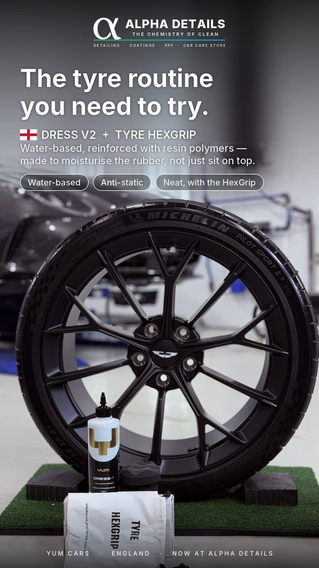 Yum Cars Tyre HexGrip applicator with Yum Dress V2 in front of a satin black wheel at the Alpha Details studio