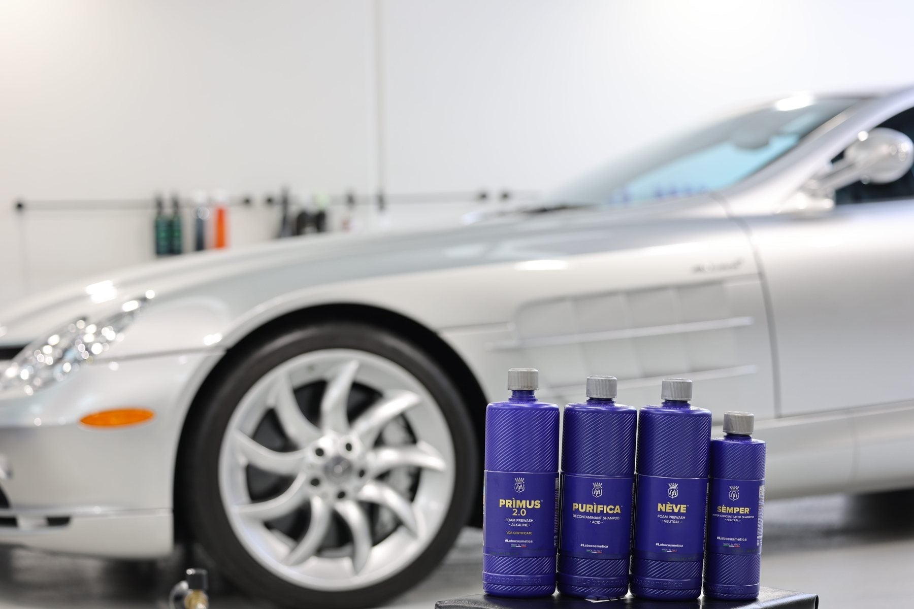 Labocosmetica Primus, Purifica, Neve and Semper lined up beside a Mercedes SLR at Alpha Details Melbourne