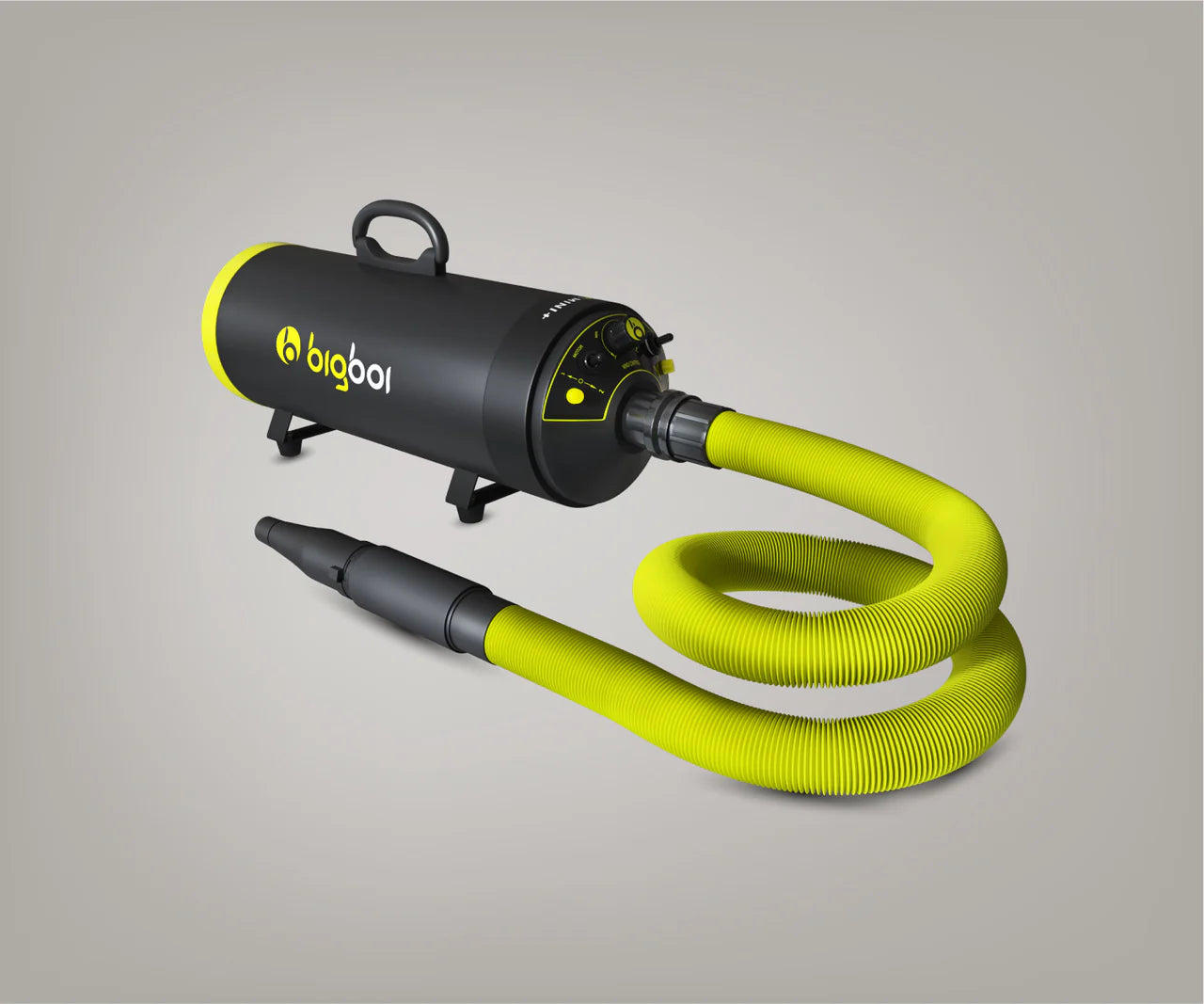 Bigboi BLOWR MINI+ side view showing variable speed dial, coiled yellow hose, and dual concentrator nozzle tips for touchless drying